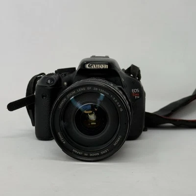 Canon EOS Rebel T3i Digital SLR con lente Canon Zoom EF 28-135 mm Foto 1 de 4