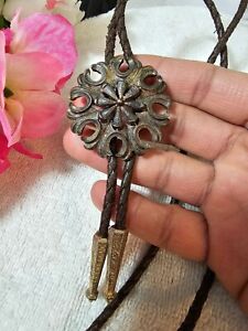 Signed Para Bolo Tie Gold Tone/Brass Flower Design Brown Leather Cord 35in"