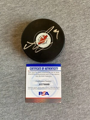 NEW JERSEY DEVILS- ALEXANDER HOLTZ AUTOGRAPH LOGO PUCK PSA AL75089 - Image 1 of 2