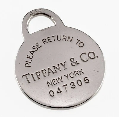 Tiffany & Co. Plata de Ley "Vuelta A "Etiqueta Charm W/ Serial Número Bonito - Imagen 1 de 4