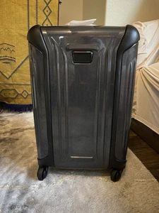 TUMI VAPOR 22" INTERNATIONAL CARRY-ON HARDCASE SPINNER LUGGAGE BLACK NEW W/TAGS - Picture 1 of 6