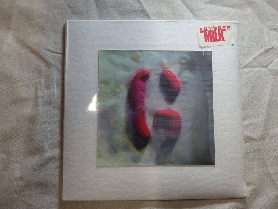Garbage : MILK - UK numbered Hologram 7" vinyl - 1996  NEW & SEALED - Image 1 of 1
