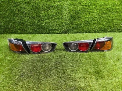 08 09 10 11 12 13 14 15 JUEGO DE LUCES TRASERAS MITSUBISHI EVOLUTION OEM Foto 1 de 4