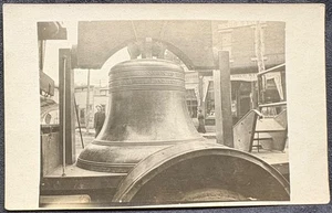 REAL PHOTO POSTCARD RPPC-LIBERTY BELL ON PLATFORM-UNKNOWN STREET SCENE - Picture 1 of 2