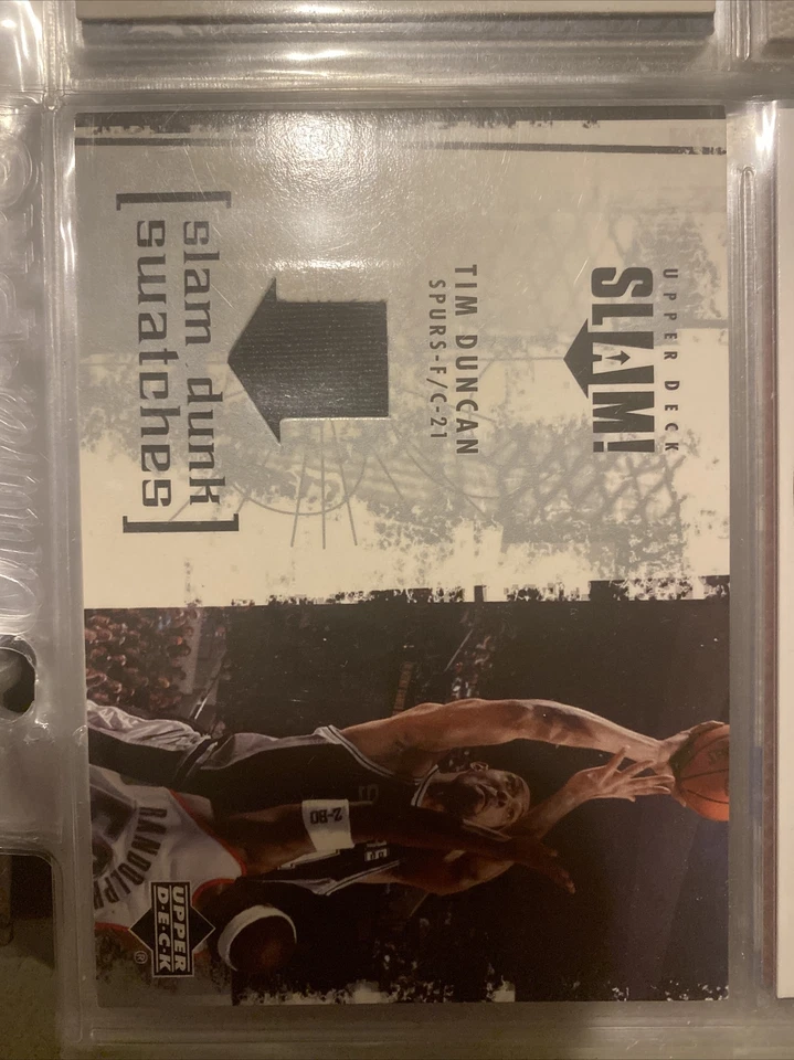 2005 Upper Deck Slam Dunk Swatches Tim Duncan NM+ NBA Game Worn Spurs Jersey - Image 1 of 1