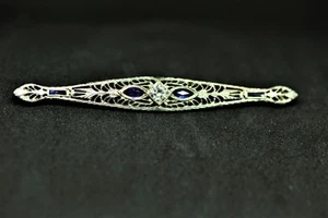 Pin de diamante y zafiro oro blanco de 14 K alrededor de 1920 Aprox diamante de 0,40 quilates. - Imagen 1 de 7
