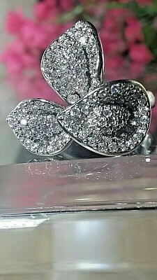 STERLING SILVER CUBIC ZIRCONIA 3  FLOWERS RING BY ESPO - Image 1 of 4