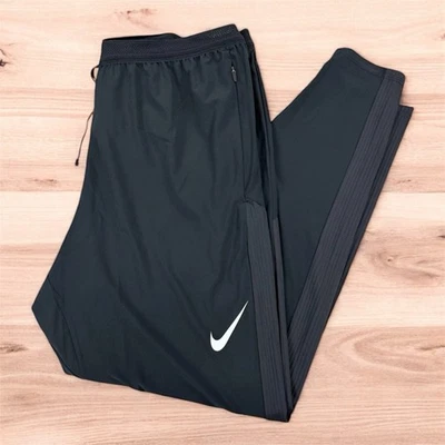 Calça de corrida Nike Aeroswift ADV Dri-Fit preta FN3361-010 masculina tamanho grande - Imagem 1 de 4