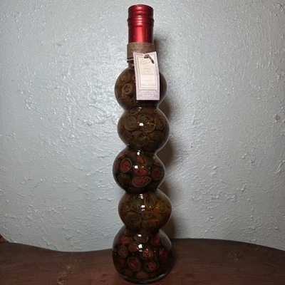 Botella de vidrio decorativa vintage de vinagre con infusión de chile  Foto 1 de 4