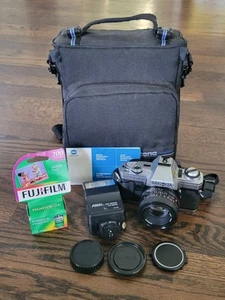 Minolta X-370 35mm SLR Film Camera - Black (Kit with 50mm 1.7 Lens and Bundle) - Picture 1 of 11