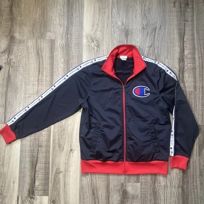 Chaqueta deportiva Champion vintage para hombre L azul marino cinta logotipo en las mangas cremallera completa Foto 1 de 4