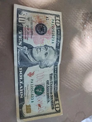 2017A Series 10 Dollar Bill - Error Paint Smear Left Side Of Bill Dark Red Spot  - Image 1 of 4