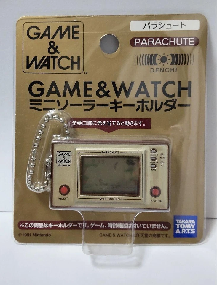 Juego y Reloj Paracaídas Mini Llavero Solar Japón Sin Abrir TAKARA TOMY ARTS Foto 1 de 2