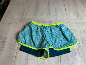 Pantaloncini da corsa Nike Dri-Fit taglia S tempo con fodera corta blu verde acqua - Foto 1 di 3