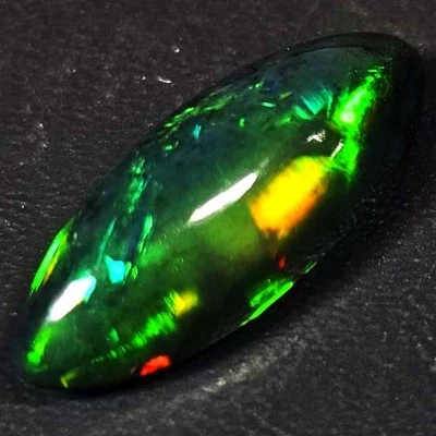 NATURAL AAA+ AMAZING COLOR PLAY MARQUISE CABOCHAN  ETHIOPIAN BLACK OPAL 3.35 CTS - Image 1 of 3