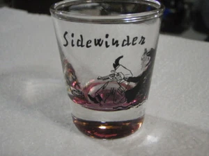 VINTAGE WESTERN COWBOY COMICAL SIDEWINDER SHOT GLASS PURPLE TINT USA BAR WHISKEY - Picture 1 of 10