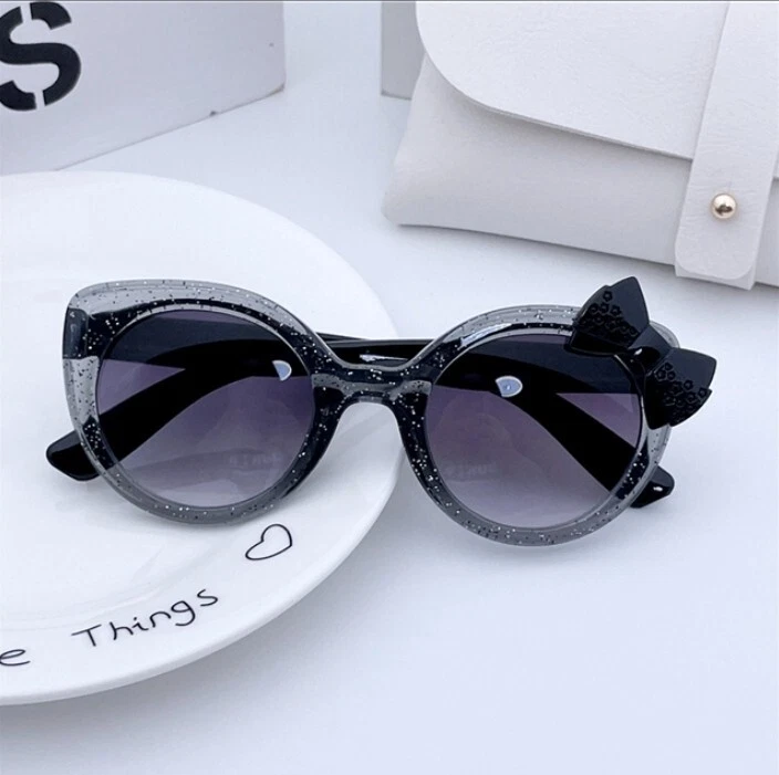 Gafas de sol niños niñas brillo rosa arco boutique accesorio ojo de gato negro Foto 1 de 1