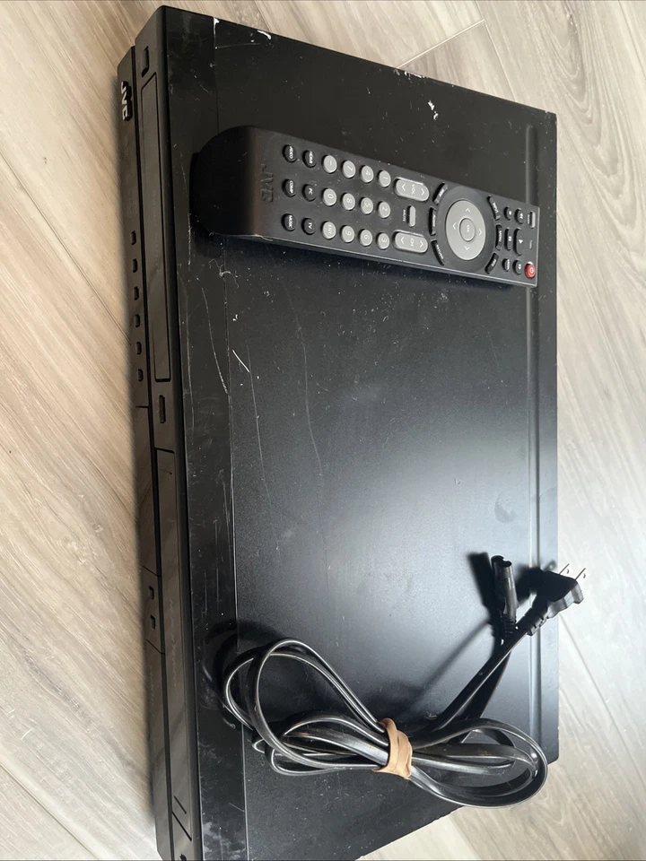 JVC DR-MV150B DVD VHS Combo Grabadora REPRODUCTOR CON CONTROL REMOTO Y FUENTE DE ALIMENTACIÓN. Foto 1 de 4