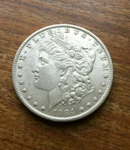 1884-O Silver Morgan Dollar - Picture 1 of 2
