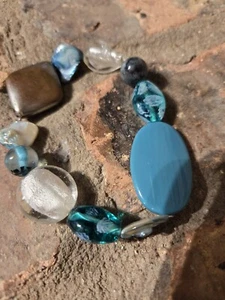 Bracciale Blu Trasparente Marrone Elastico Gioielli Sirena Nucleo - Foto 1 di 6