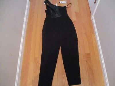 new with tags BCBGeneration  MSRP$108 Black Jumpsuit Ruffle One Shoulder - Image 1 of 4