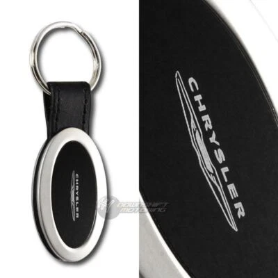 Llavero con logotipo de Chrysler negro ovalado cuero cromado etiqueta llavero cordón Foto 1 de 2