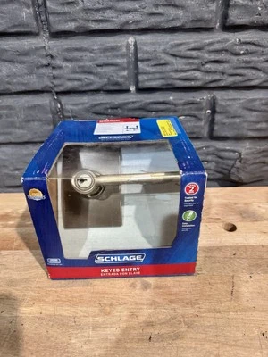 Palanca de puerta de entrada Schlage F51 V Lat 619 acento con llave níquel satinado - CAJA ABIERTA Foto 1 de 4