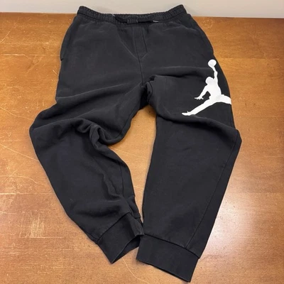 Pantalones deportivos Jordan para hombre medianos negros polar activos bolsillos logotipo grande Foto 1 de 4