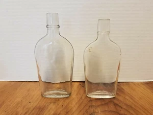 2 Vintage Clear Glass Pocket Flasks bottles small decanters 5 7/8" & 5 1/2" - Picture 1 of 5