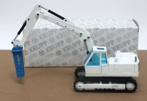 Excavadora NZG 247 Eder 835 con Krupp Rock Hammer Diecast 1:50 W. Alemania Muy buena Caja - Imagen 1 de 9