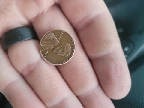 1963 penny with L misprint Cover