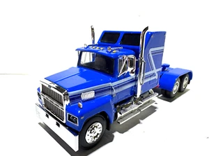 DCP / FIRST GEAR 1/64 SCALE FORD LTL 9000 STAND UP BLUE WITH GRAY & BLUE STRIPES - Picture 1 of 6