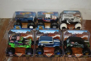 HUGE LOT OF 6 1:24TH SCALE MONSTER TRUCKS GRAVEDIGGER & BIGFOOT JAM 40TH - Picture 1 of 9