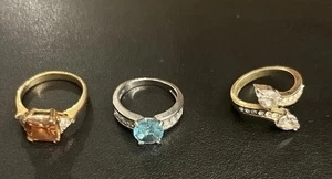 Trachtenring Konvolut Strass blau kastanienbraun klar Schmuck - Bild 1 von 2