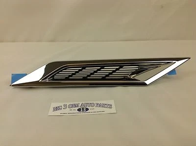 Cadillac CTS хромированное украшение на вентиляционный порт переднего крыла левая сторона новое от оригинального производителя 20881029 - Изображение 1 из 4