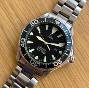 A  genuine steel Omega Seamaster 300 wristwatch sold for parts