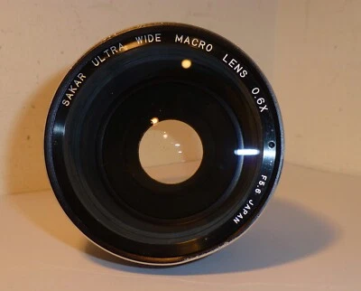 SAKAR 0.6X WIDE CONVERSION LENS , SCREWS onto 49mm FILTER THREADS - Image 1 of 4