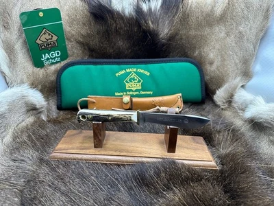 Cuchillo Puma 6397 Hunter's Pal 1982 asas de ciervo y funda de cuero caja G/Y - como nuevo Foto 1 de 4
