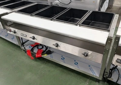 Mesa de comida caliente Vollrath 38104 ServeWell, 700 W / 120 V / 4 pozos / usada Foto 1 de 4