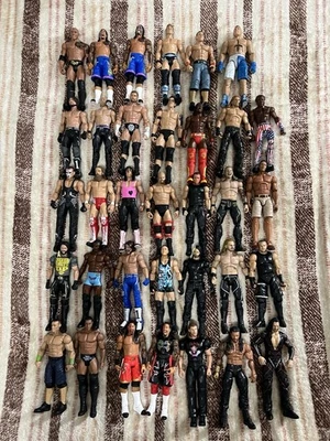 Colección de figuras de lucha libre WWE básicas y élites Foto 1 de 4