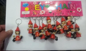 12 Llavero Pinocho Madera Suerte Amuleto 1 Corneta Charms - Imagen 1 de 1