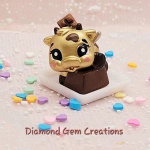Hatchimals Colleggtibles - REPAINT Golden Gold Chocolate Bar Macow / lynx - Picture 1 of 1