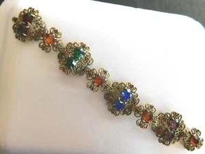 "Brazalete de filigrana de malla dorada vintage con piedras verdes rojas ámbar azul-7 3/4" - Imagen 1 de 6