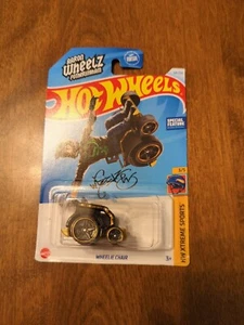 2024 Hot Wheels #64 HW Xtreme Sports SEDIA 3/5 RUOTE nera con oro Aaron Wheelz - Foto 1 di 4