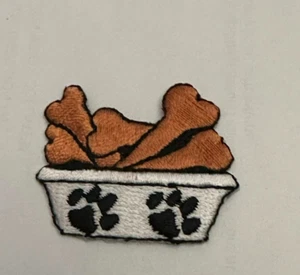 DOG BOWL WITH DOG BONE TREATS Iron On Patch Applique 1.5" w x 1 1/8" h - Picture 1 of 3