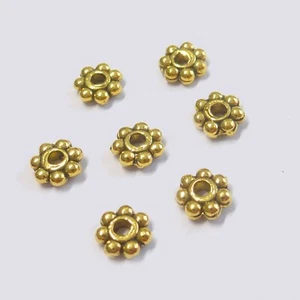 Cuentas de metal espaciador flores 4 mm color oro antiguo 200 cuentas diseño nenad AN010 - Imagen 1 de 9