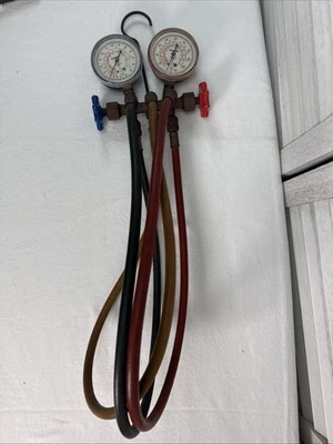 Juego de manómetros de aire acondicionado vintage Robinair R-22/12/502 con mangueras Foto 1 de 4