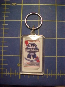 UNUSED 2 SIDED PABST BLUE RIBBON PLASTIC KEY RING! PBR KEY CHAIN - Picture 1 of 3