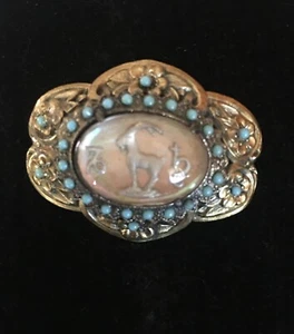 Broche vintage Capricornio CABRA cuentas turquesa hormiga. Cúpula de vidrio con acabado dorado plateado - Imagen 1 de 10