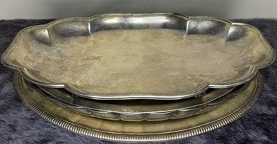 Juego de 4 platos plateados de colección Foto 1 de 4